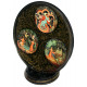 Plate on a stand with an apple