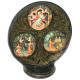 Plate on a stand with an apple